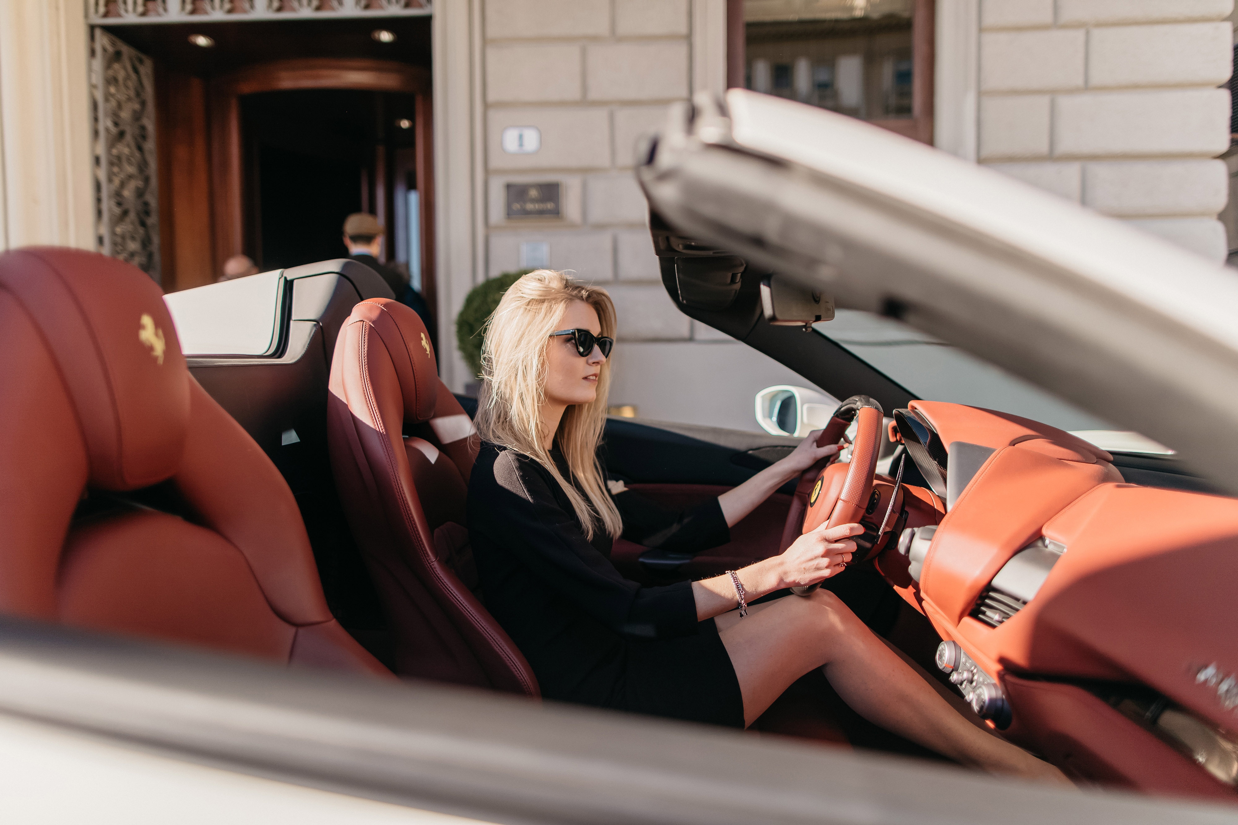 Woman driving a convertible